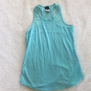 a teal tank top hardly worn